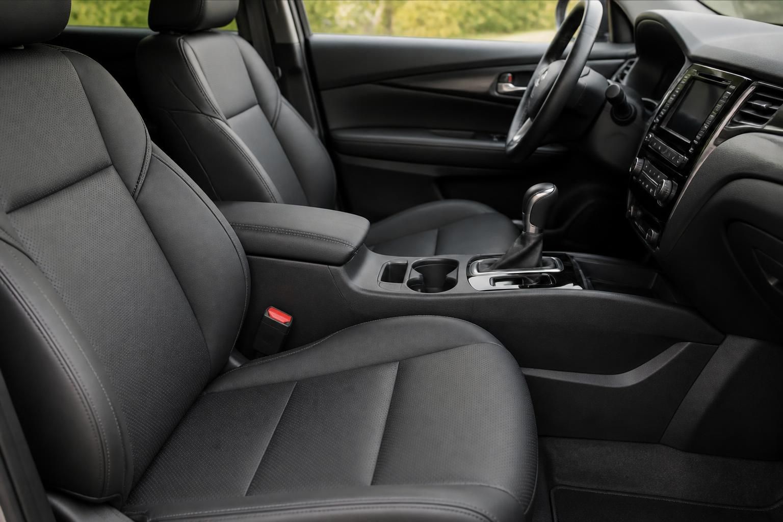 Spotless car interior with clean seats and dashboard surfaces.
